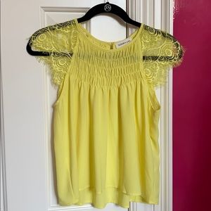 Top with lace cap sleeves